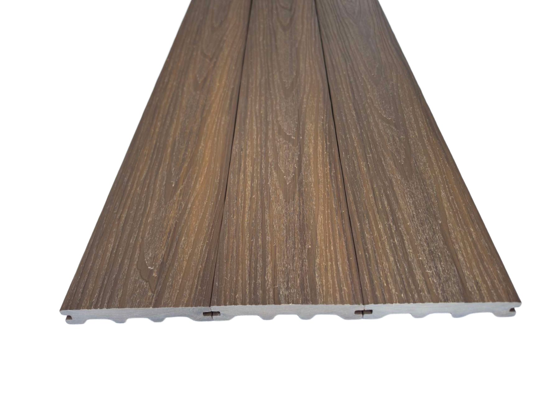 Walnut capped composite deck boards with grooved edge and multi-tone wood grain